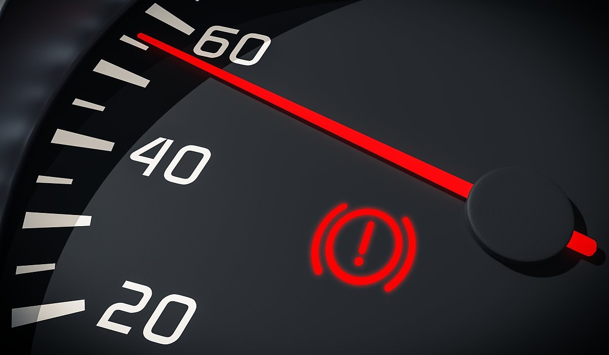 Illuminated red brake system warning light on a vehicle instrument cluster